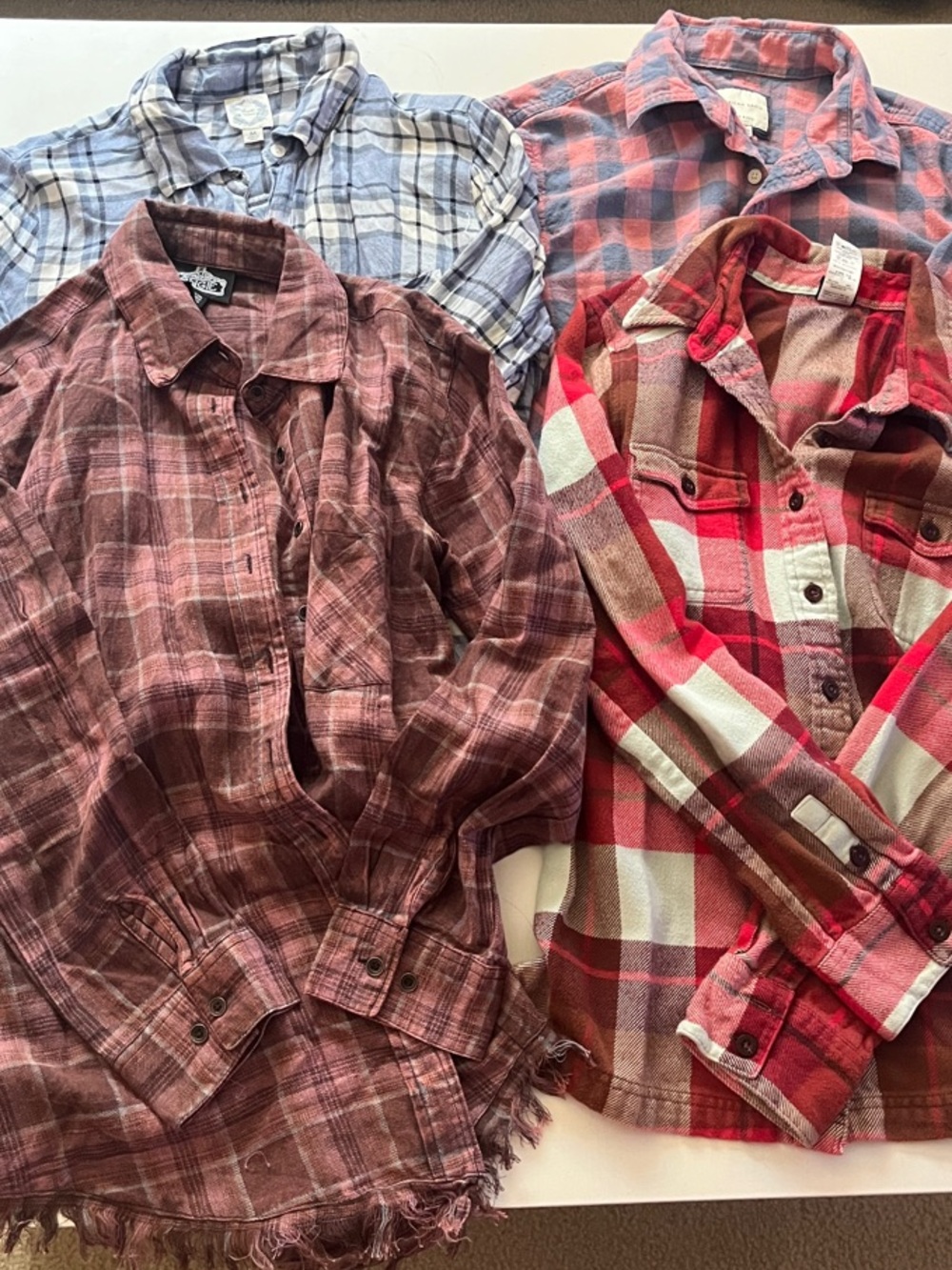 Bundle of 4 women’s plaid button down shirts size small